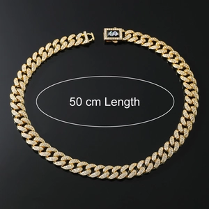 Detailed view of a 50 cm golden iced-out Cuban link chain with a dollar sign clasp
