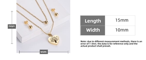Detail view of heart tree pendant and stud earrings with precise dimensions