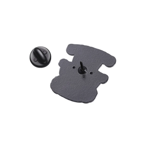 Black matte alloy enamel pin back with durable rubber clutch for securing badges
