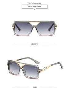 Macro view of square sunglasses with gray pink gradient lenses and golden metal details