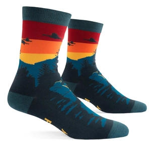 Detail view of cotton crew socks featuring artistic sunset mountain landscape and forest design
