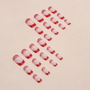 Red French tip press-on nails with silver glitter gradient on medium square shape