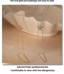 Detailed close-up of gold and silver starfish pendant Y-chains with realistic textures