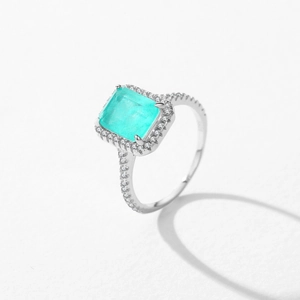 Elegant s925 silver ring featuring a large square paraiba blue stone and pavé zirconias