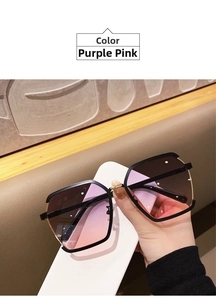 Detail of purple-pink gradient lenses on half-frame sunglasses with metal accents