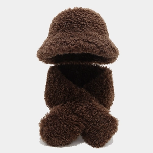 Detail of dark brown plush faux shearling winter hat and cross-scarf set for women