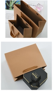 Detail of premium brown kraft paper gift bags with reinforced handles and sturdy flat bottom