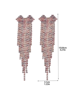 Detailed view of long luxury rhinestone fringe earrings with pink and purple gradient