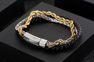 Detail of multi-strand braided leather bracelet with stainless steel chain and metal clasp