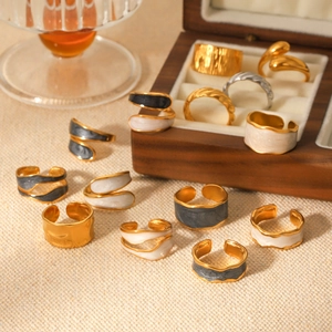 Minimalist enamel stainless steel open rings with gold finish and irregular textures