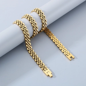 Detail of 10mm golden stainless steel watch band chain with a secure folding clasp