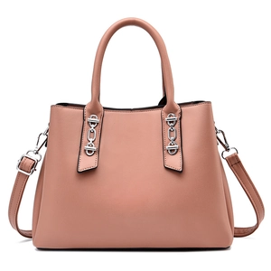 Elegant dusty rose faux leather handbag with silver chain hardware and dual top handles