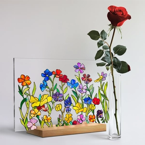 Detail view of 3D floral acrylic table decor with patterns on a solid wooden base