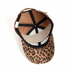 Detailed interior of cotton leopard print baseball cap showing inner lining and stitching