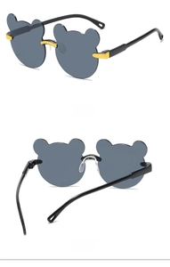 Side and back view of children's bear-shaped sunglasses with gold bridge and dark lenses