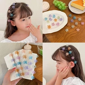 Colorful star-shaped mini hair claws for girls in transparent matte plastic set