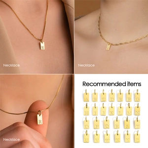 Gold plated stainless steel square alphabet pendant necklace set featuring letters A-Z