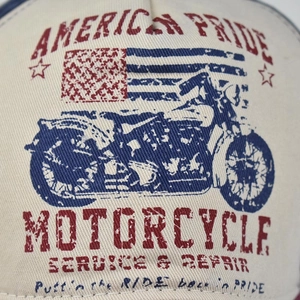 Close-up of vintage American flag and motorcycle print on washed cotton baseball cap