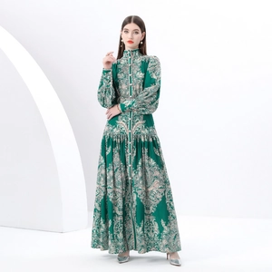 Vintage green paisley maxi dress with stand collar, lantern sleeves and tiered skirt details