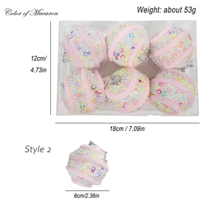 Detail of pink 6cm macaron Christmas ball ornaments with colorful foam beads and sequins