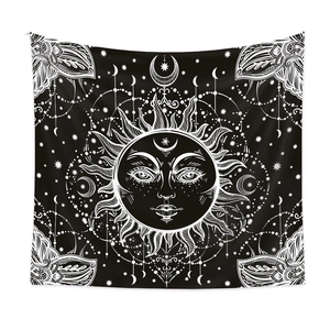 Mystical sun and moon tapestry with black and white astrological patterns for wall decor