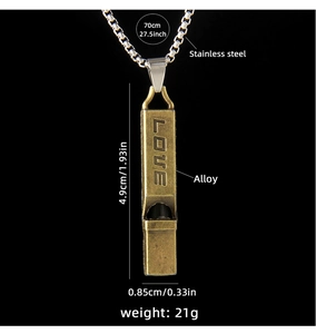 Detail view of vintage whistle pendant with dimensions and stainless steel chain specs