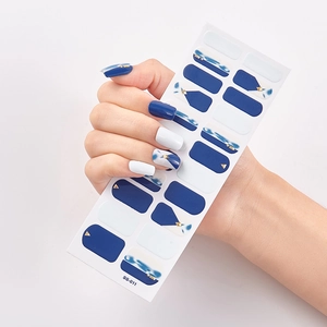 Detail of SS-011 nail stickers with dark blue, white marble patterns and gold accents