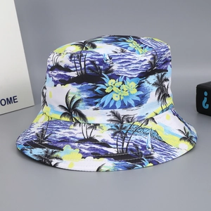 Reversible tropical coconut tree print bucket hat for sun protection in blue and yellow