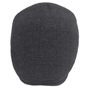 Detailed close-up of dark grey plaid wool flat cap showing vintage check pattern and texture