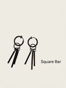 Close-up of black titanium hoop earrings with geometric square bar drop pendants
