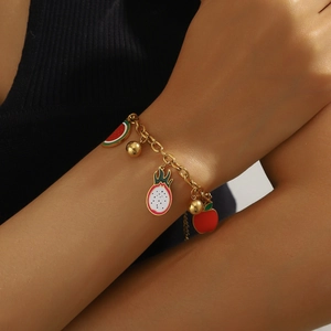 Golden stainless steel chain bracelet with colorful watermelon and dragon fruit charms