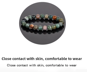 Detail of 8mm natural stone beaded bracelet showing colorful round polished gemstone beads