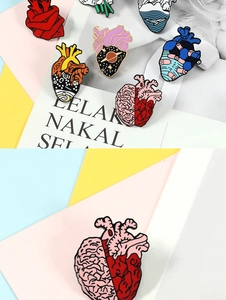 Creative enamel heart and brain pin with colorful starry sky and artistic details