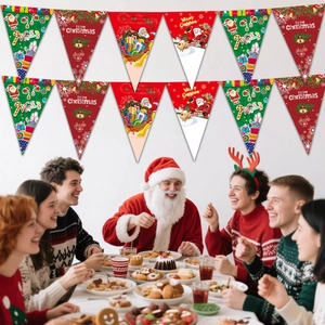 Close-up of Merry Christmas triangle bunting banners hanging over a festive holiday party