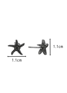 Detail view showing antique silver starfish earrings with textured finish and 1.1cm dimensions