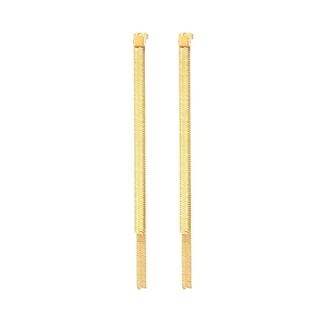 Close-up of elegant gold long snake bone chain drop earrings for women's summer style
