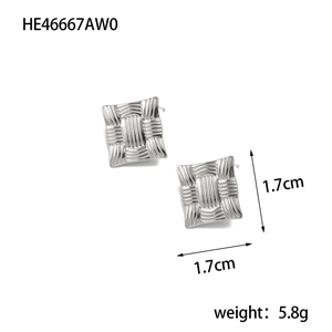 Macro view of silver square earrings with woven texture detailing and 1.7cm size