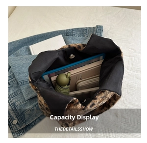 Interior view of leopard print plush tote showing large capacity for tablet and umbrella