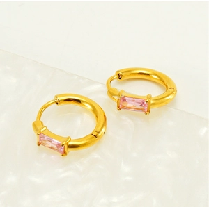 Detail shot of gold-plated hoop earrings featuring a rectangle pink zircon gemstone