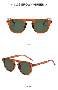 Front and 45-degree angle view of retro translucent tea-colored sunglasses with green lenses