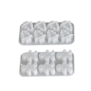 Christmas silicone molds set featuring 8-cavity tree and 6-cavity gingerbread man designs