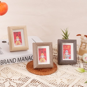 Three minimalist wooden frames with Chinese inspirational cards for graduation gifts