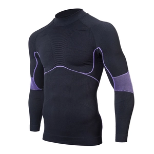 Detail of compression base layer with purple stitching and breathable mesh texture