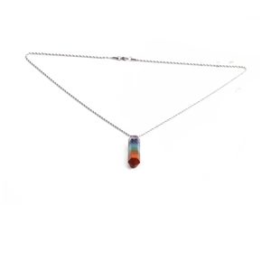 Detail of a rainbow hexagonal crystal pendant with a silver twist chain and lobster clasp