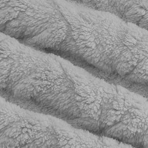 Close-up of thick grey fuzzy fleece fabric texture with soft plush fibers and warm feel