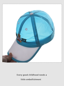 Detail showing blue mesh sun hat with bear embroidery and transparent plastic brim