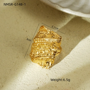 Macro view of gold hammered texture stainless steel ring with 3cm x 2.1cm dimensions