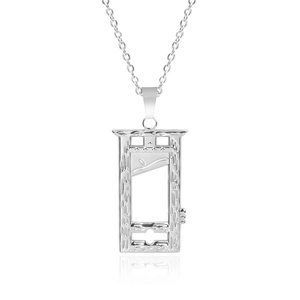 Macro detail of gothic style stainless steel guillotine pendant with silver finish