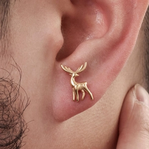 Men's gold stag head stud earring in stainless steel with a polished vintage finish