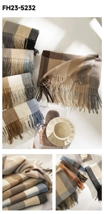 Detail of plaid tassel scarves in various colors with soft cashmere-like texture